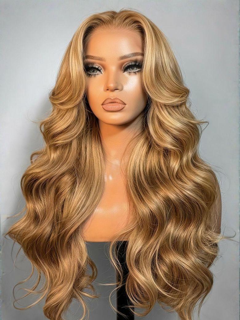 Honey blonde body wave lace human hair wig with face-framing feathered layers on a mannequin.